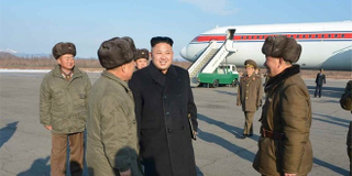 Illustration for article titled 'Look At My Fancy New Airport Terminal,' Says Noted Despot Kim Jong Un